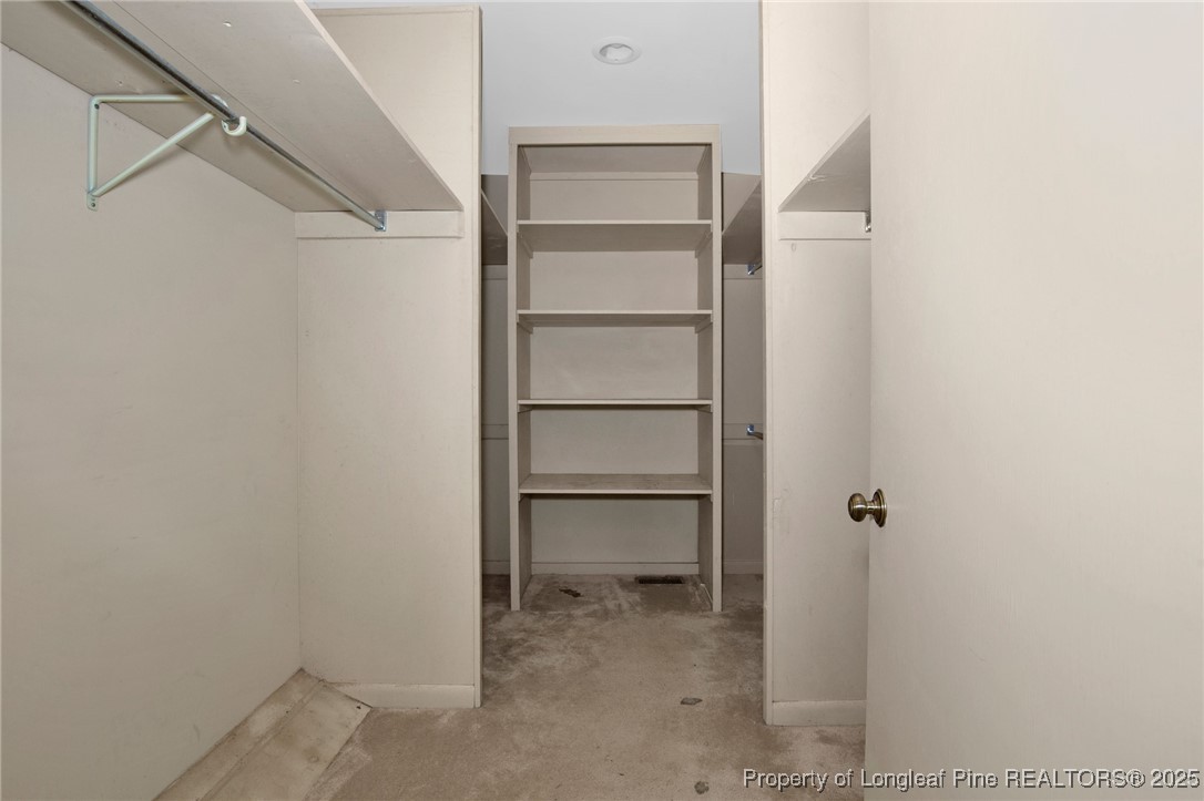 549 Rainforest Road Hope Mills, NC 28348 - Photo 22 of 40 a view of an empty walk in closet