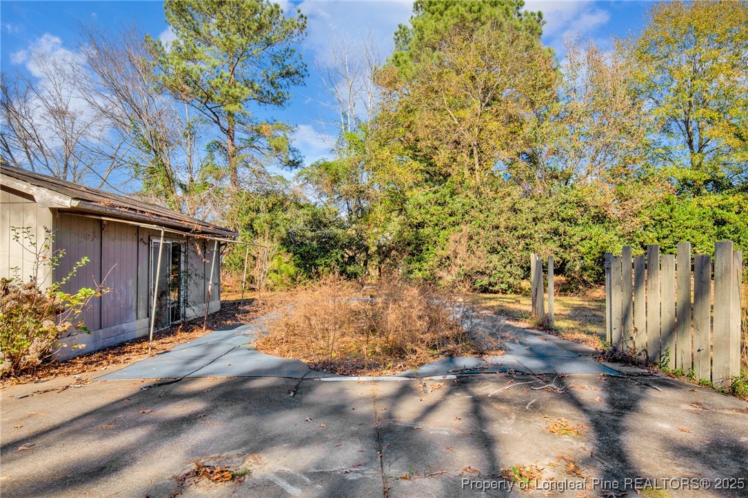 549 Rainforest Road Hope Mills, NC 28348 - Photo 35 of 40 a view of a house with a tree