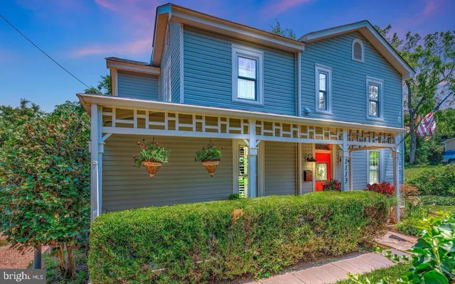 front view of a building with a small yard