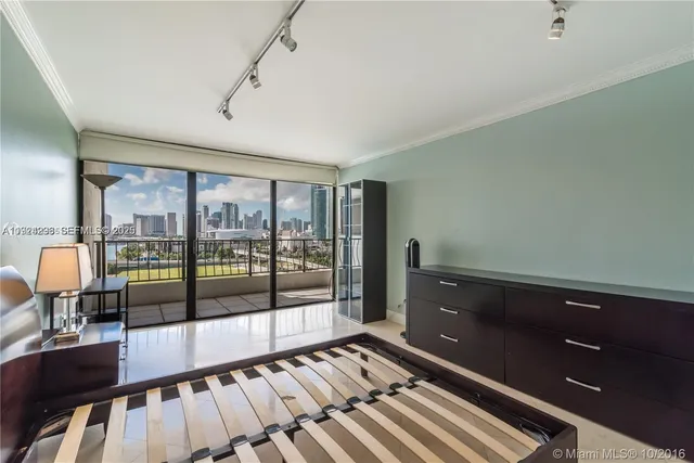 a view of an empty room with a large window