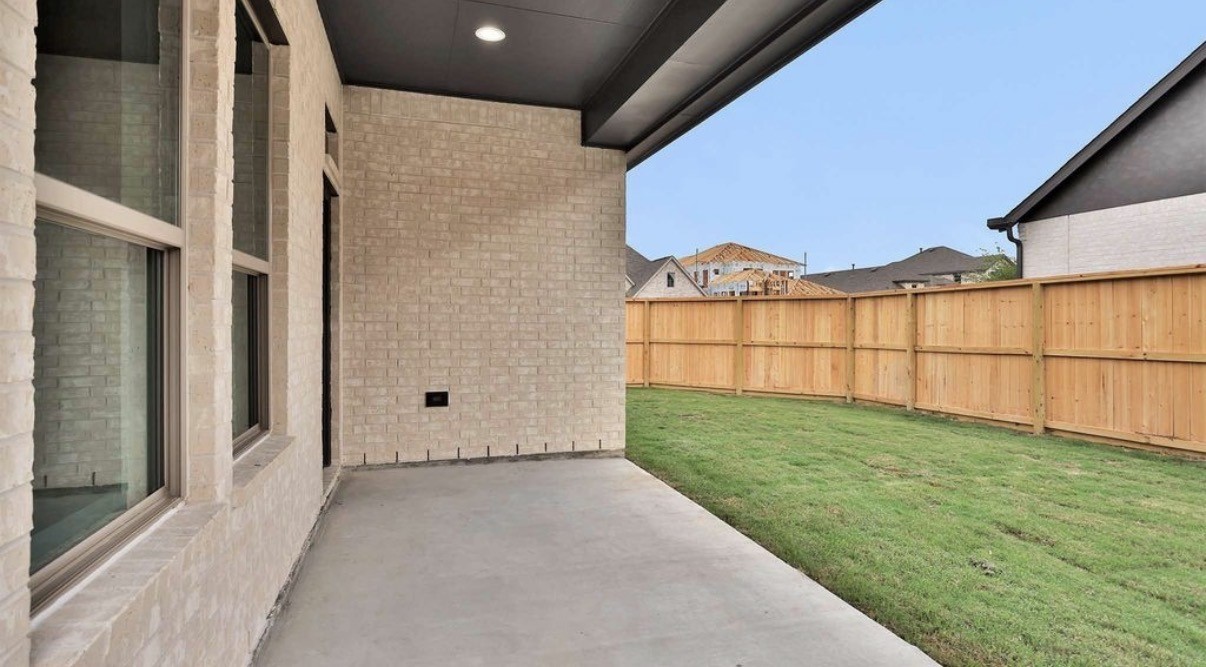 303 Eileen Drive Rosenberg, TX 77471 - Photo 15 of 17 a view of a backyard with a garden