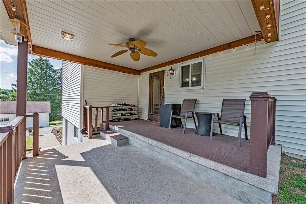 2112 Claridge Elliott Road Claridge, PA 15623 - Photo 4 of 25 a view of a patio with table and chairs