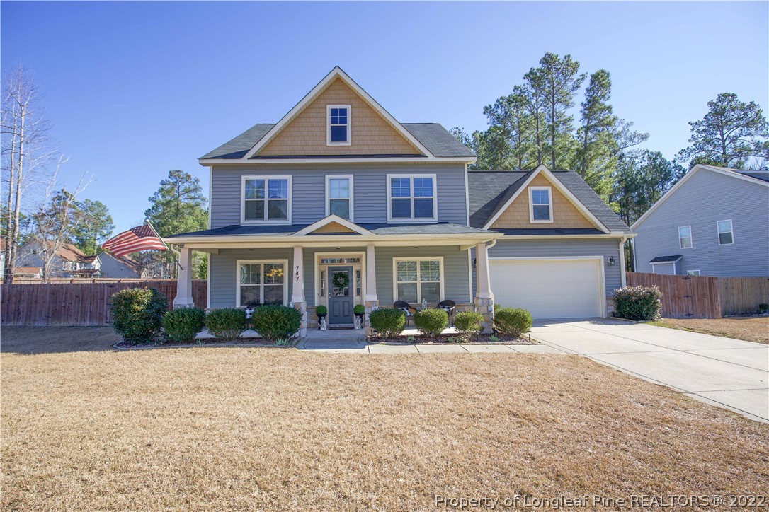 747 Sun Road Aberdeen, NC 28315 - Photo 1 of 48 a front view of a house with a yard
