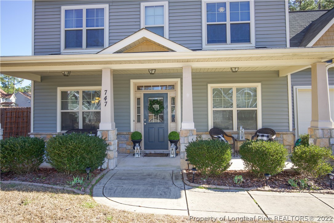 747 Sun Road Aberdeen, NC 28315 - Photo 2 of 48 a front view of a house
