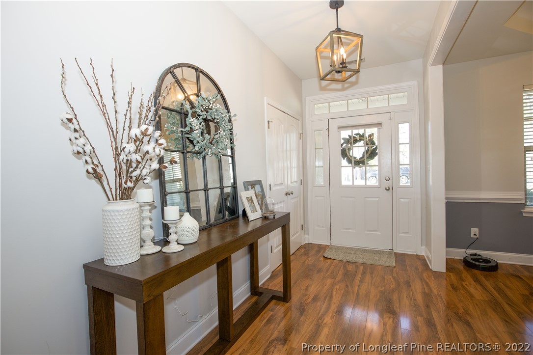 747 Sun Road Aberdeen, NC 28315 - Photo 4 of 48 a view of entryway with wooden floor