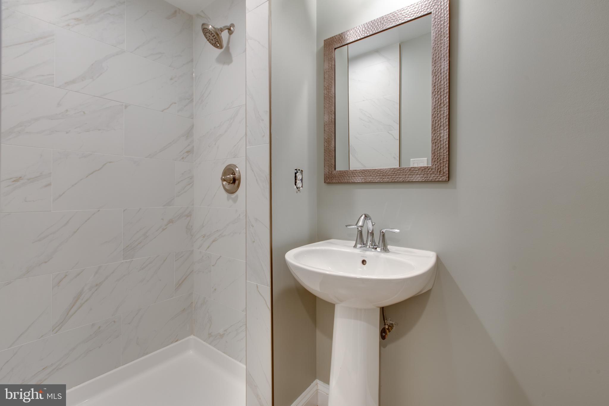 15305 Sweetridge Road Silver Spring, MD 20905 - Photo 5 of 45 Full Bathroom-Main Level