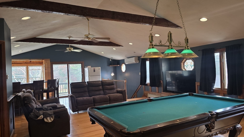 64 Village Street Millis, MA 02054 - Photo 22 of 37 a living room with furniture and a pool table