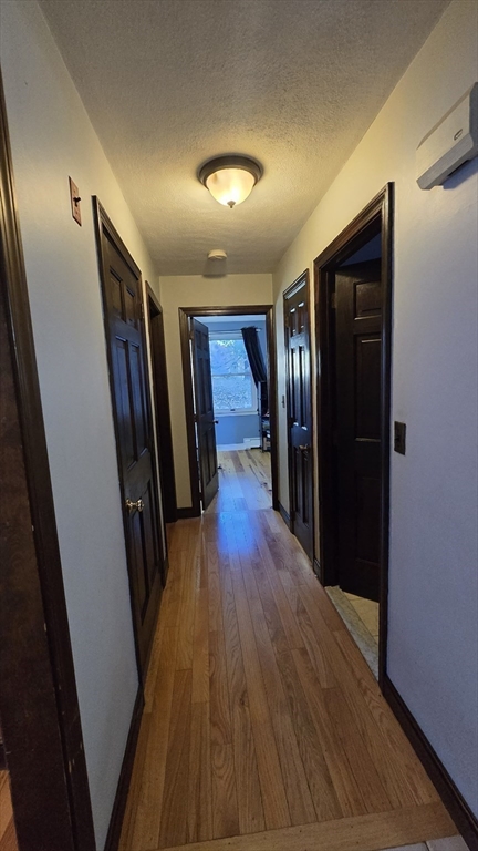 64 Village Street Millis, MA 02054 - Photo 27 of 37 a view of entryway with wooden floor