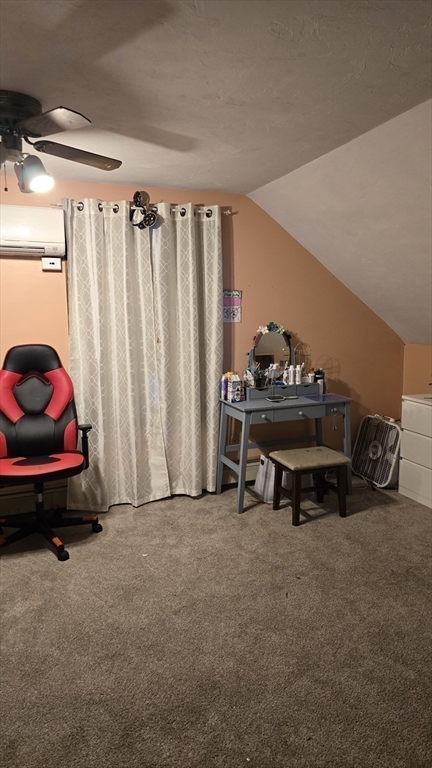 64 Village Street Millis, MA 02054 - Photo 29 of 37 a car parked in a room next to a window