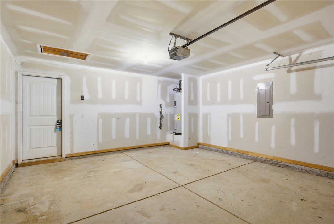 245 Maple Grove Road Seneca, SC 29678 - Photo 32 of 40 This spacious garage offers ample room and direct access to the home.