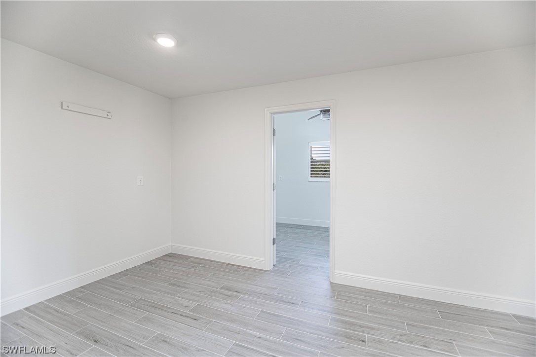 1753 Club House Road North Fort Myers, FL 33917 - Photo 14 of 24 wooden floor in a room