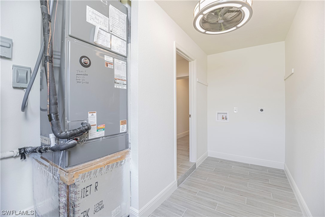 1753 Club House Road North Fort Myers, FL 33917 - Photo 23 of 24 a bathroom with a sink and a mirror