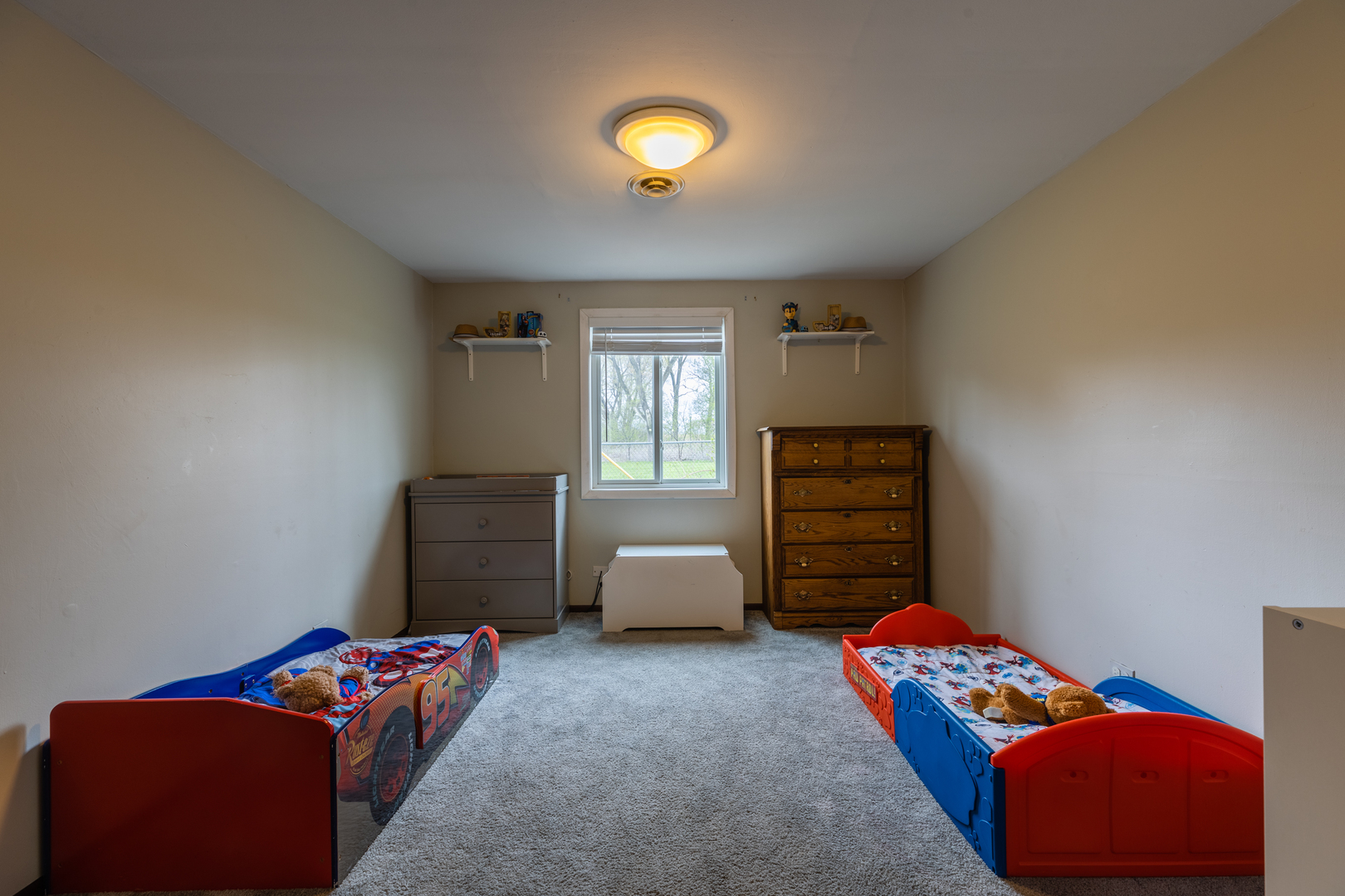 336 Sunset Lane Wheeling, IL 60090 - Photo 12 of 19 a living room with furniture and a window
