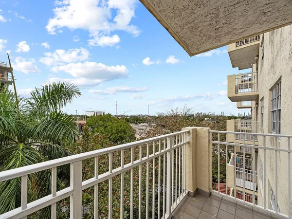 a view of a balcony with city view