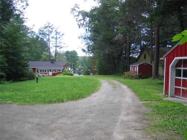 107 West Millbury Road Sutton, MA 01590 - Photo 4 of 26 a view of a house with a yard and tree s
