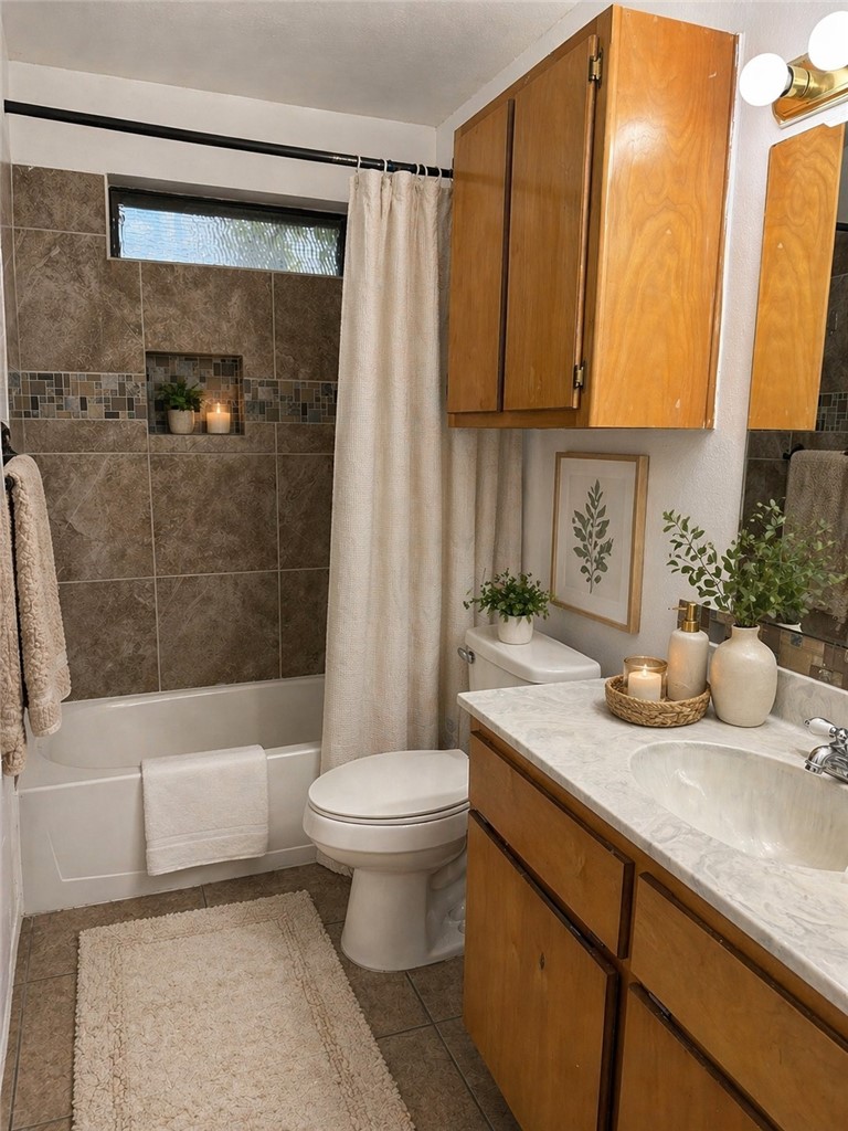 2328 Timberleaf Circle Ingleside, TX 78362 - Photo 15 of 33 a bathroom with a granite countertop sink a toilet and bathtub
