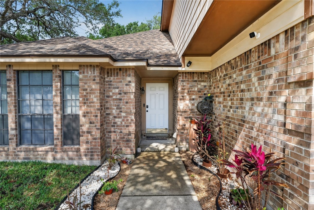 2328 Timberleaf Circle Ingleside, TX 78362 - Photo 2 of 33 a view of a pathway with a house