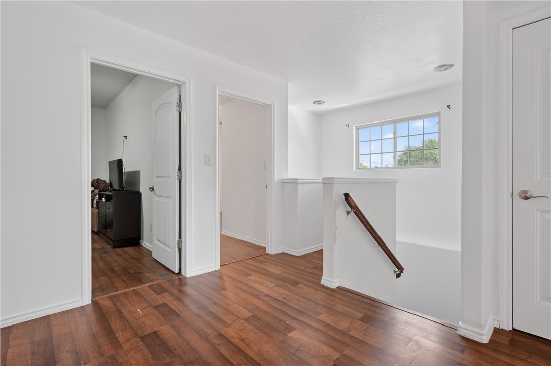 2328 Timberleaf Circle Ingleside, TX 78362 - Photo 21 of 33 a view of a hallway with wooden floor and entryway