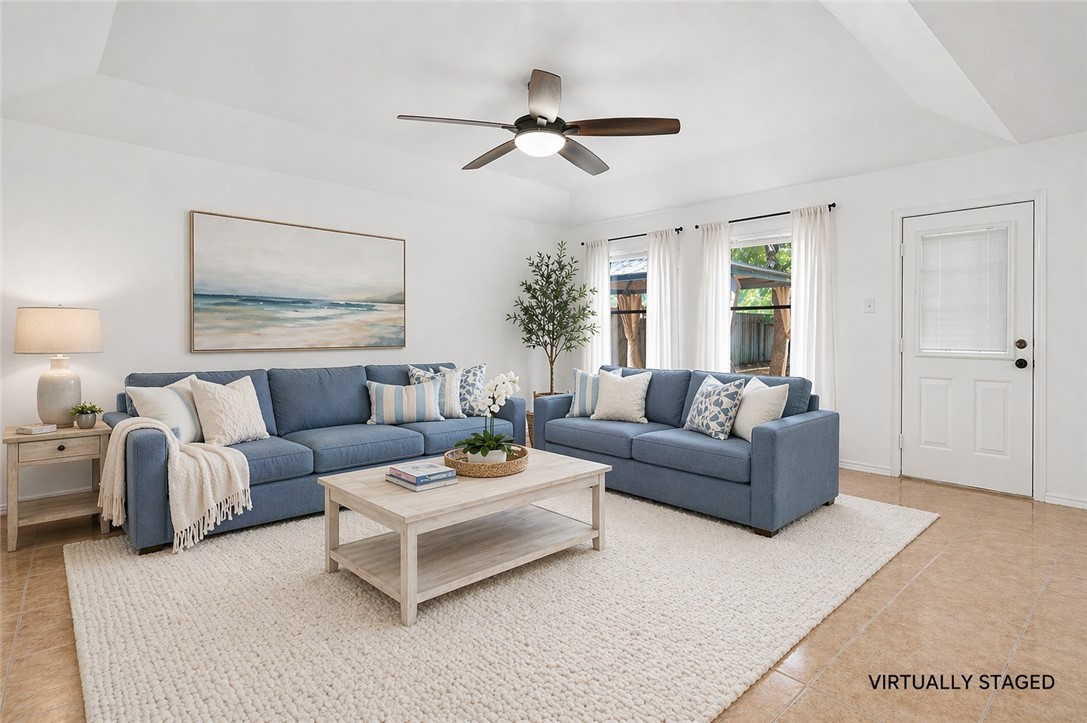 2328 Timberleaf Circle Ingleside, TX 78362 - Photo 4 of 33 a living room with furniture and a ceiling fan