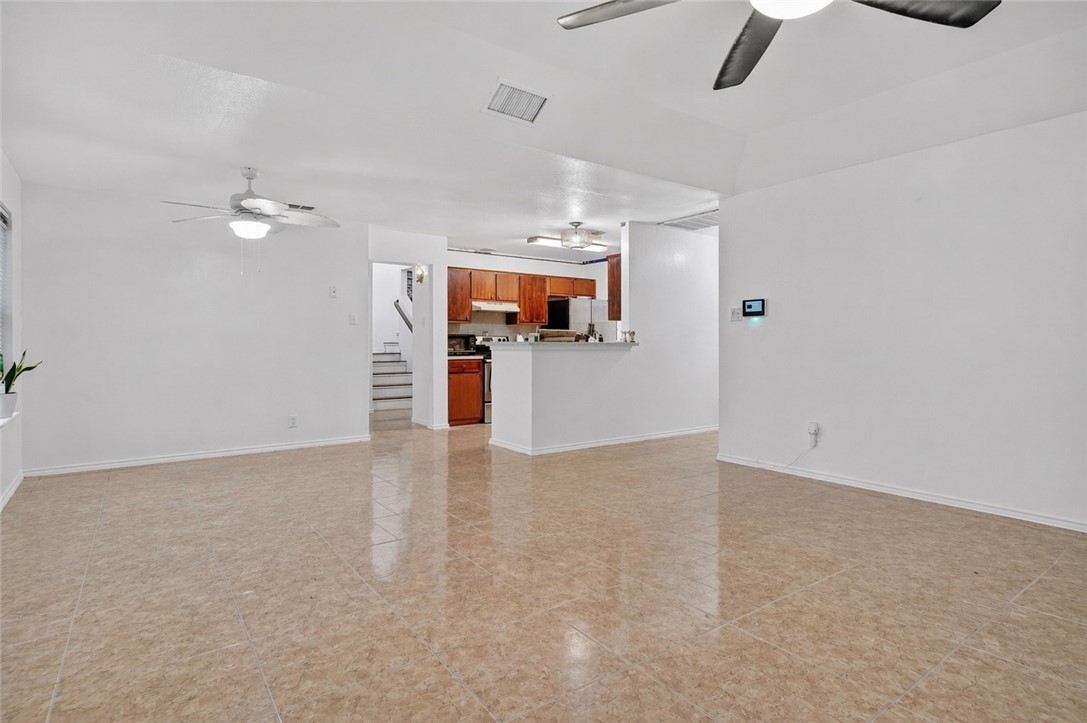 2328 Timberleaf Circle Ingleside, TX 78362 - Photo 6 of 33 wooden floor in an empty room with a window
