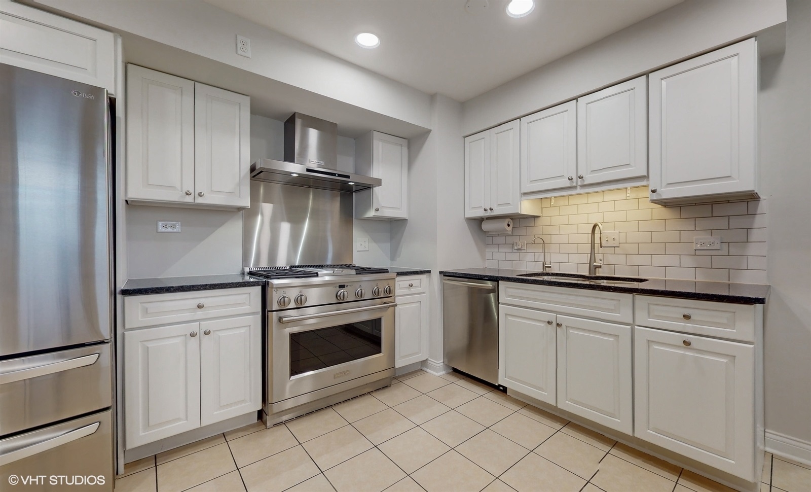 2930 Koepke Road Northbrook, IL 60062 - Photo 11 of 30 a kitchen with white cabinets stainless steel appliances and sink
