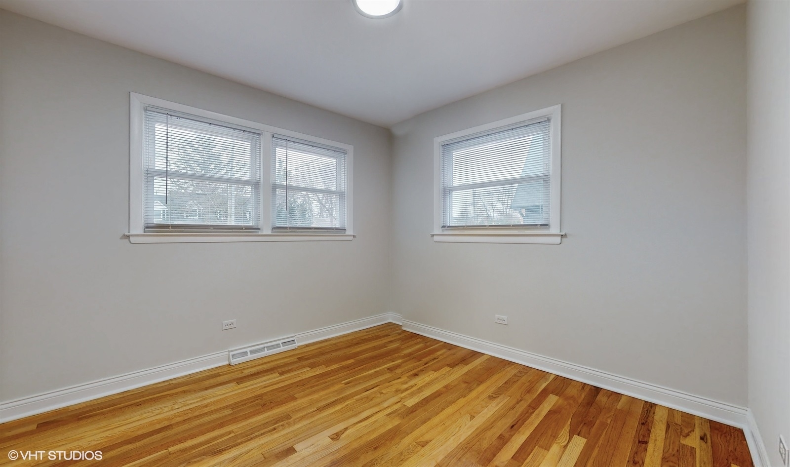 2930 Koepke Road Northbrook, IL 60062 - Photo 13 of 30 a view of an empty room with wooden floor and a window