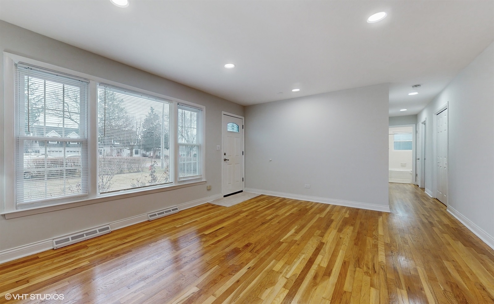 2930 Koepke Road Northbrook, IL 60062 - Photo 5 of 30 a view of empty room with wooden floor and fan