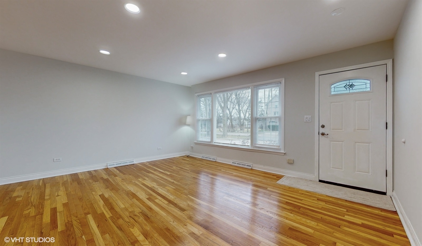 2930 Koepke Road Northbrook, IL 60062 - Photo 6 of 30 a view of empty room with wooden floor and fan