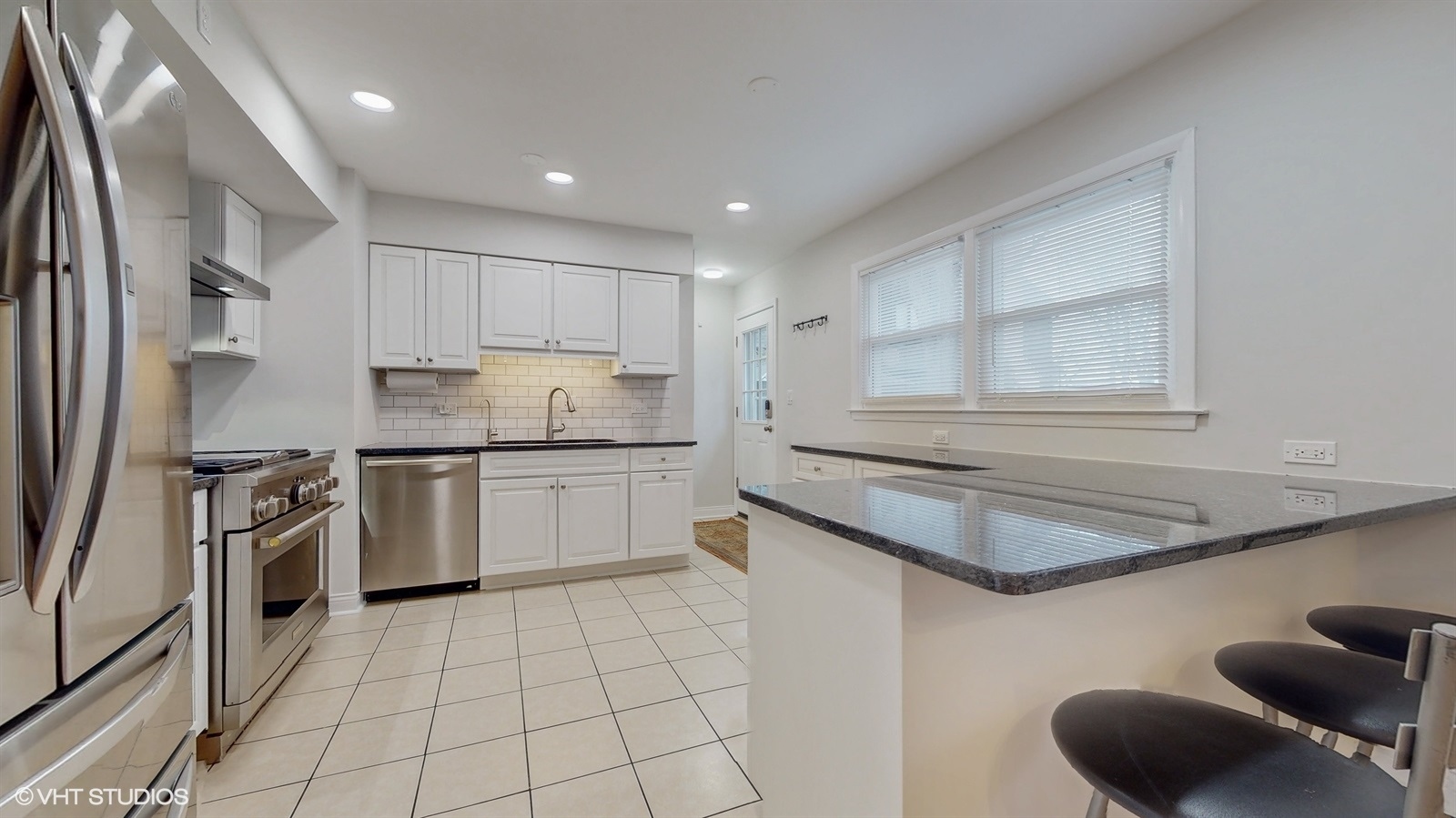 2930 Koepke Road Northbrook, IL 60062 - Photo 9 of 30 a kitchen with granite countertop a sink stainless steel appliances and cabinets