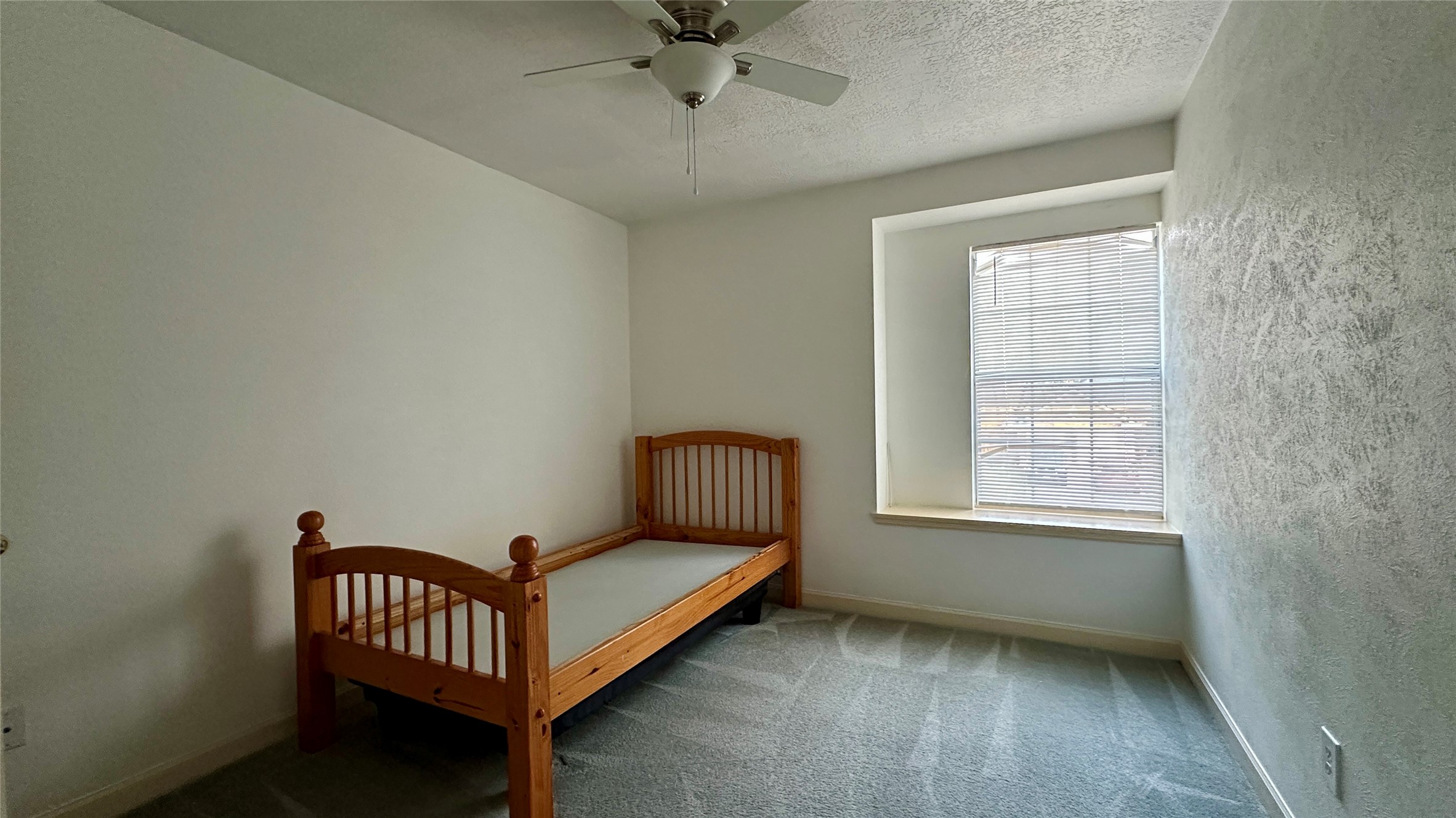 6918 Springcrest Court Sugar Land, TX 77479 - Photo 18 of 29 a view of a room with a window and wooden floor
