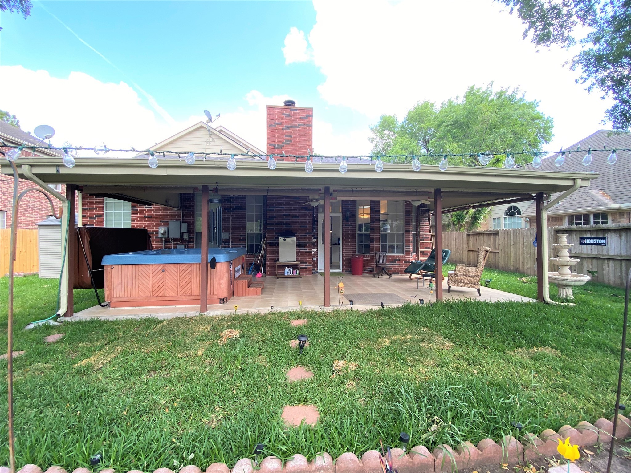 6918 Springcrest Court Sugar Land, TX 77479 - Photo 25 of 29 a view of a house with backyard porch and sitting area