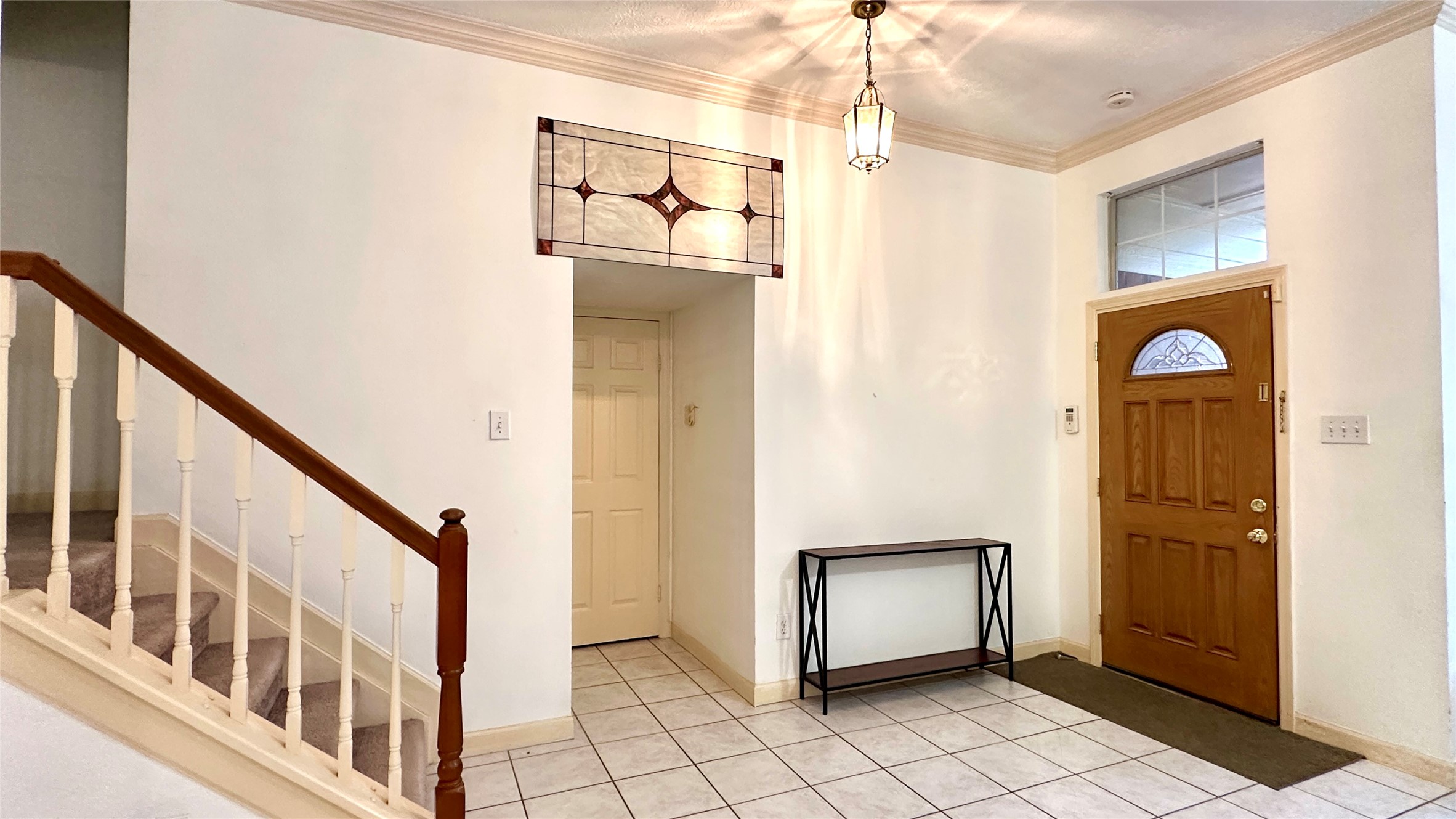 6918 Springcrest Court Sugar Land, TX 77479 - Photo 4 of 29 a view of an entryway with wooden floor