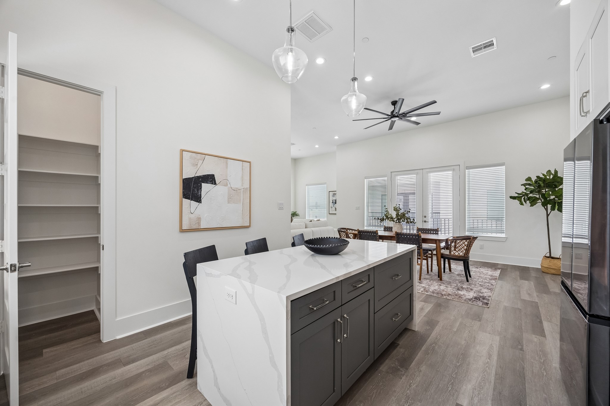 1618 Ojeman Road, Unit A Houston, TX 77055 - Photo 10 of 39 The large walk in pantry and extra storage in the island mean plenty of storage for all your cooking needs.