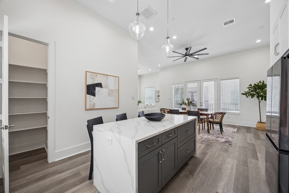 1618 Ojeman Road, Unit A Houston, TX 77055 - Photo 10 of 39 The large walk in pantry and extra storage in the island mean plenty of storage for all your cooking needs.