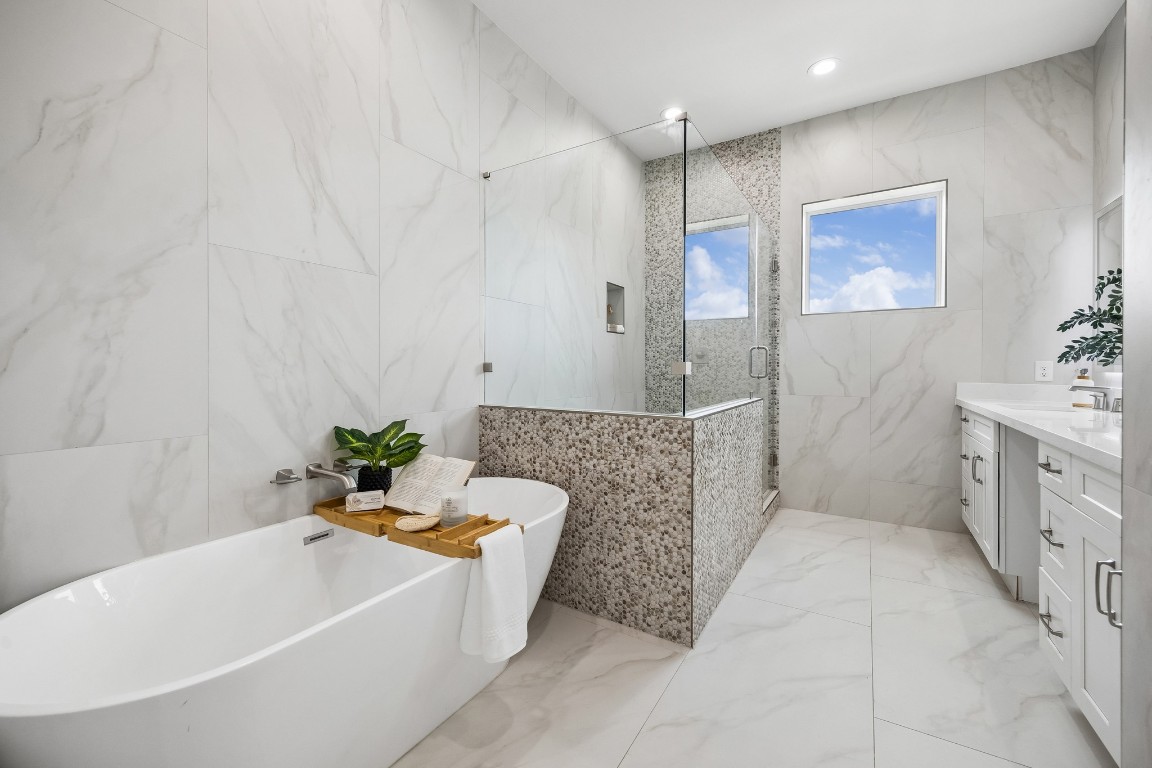 1618 Ojeman Road, Unit A Houston, TX 77055 - Photo 13 of 39 Soak away the stress of the day in the spa-like freestanding tub.