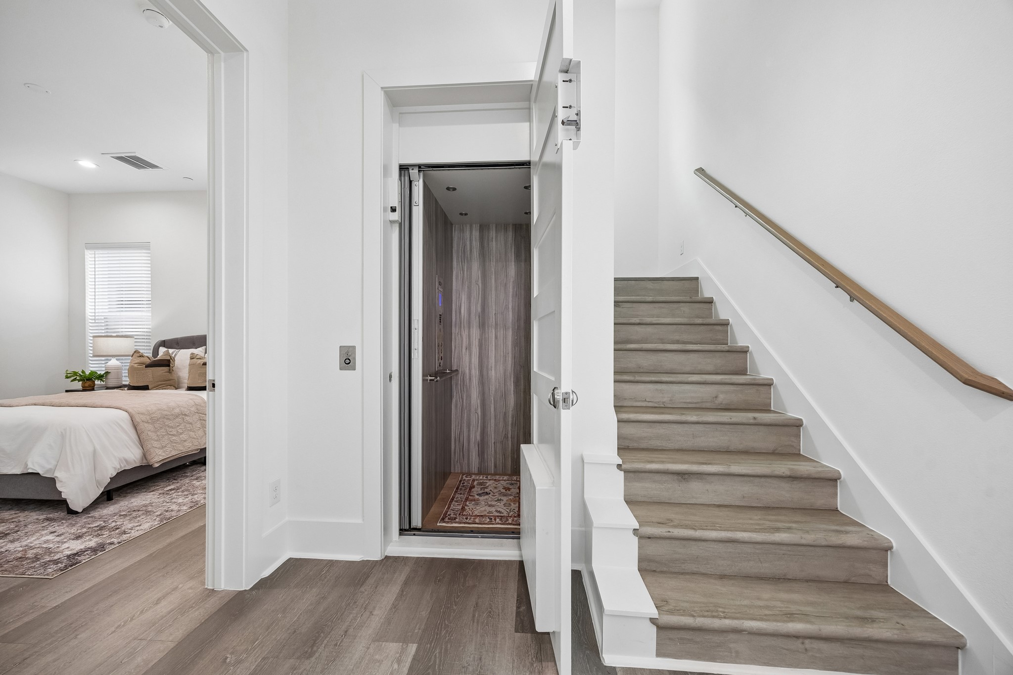 1618 Ojeman Road, Unit A Houston, TX 77055 - Photo 2 of 39 The elevator is located right in the foyer and services all four floors.