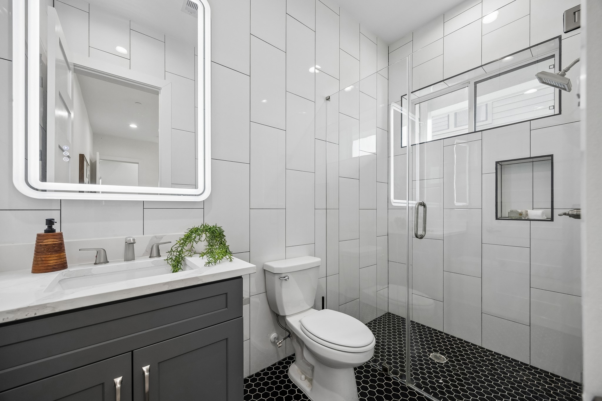 1618 Ojeman Road, Unit A Houston, TX 77055 - Photo 19 of 39 The bath on the first floor has a large and easily accessible shower.