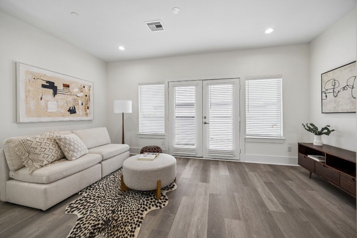 1618 Ojeman Road, Unit A Houston, TX 77055 - Photo 20 of 39 The family room on the fourth floor is a great place to relax. The French doors open onto the the expansive rooftop terrace.