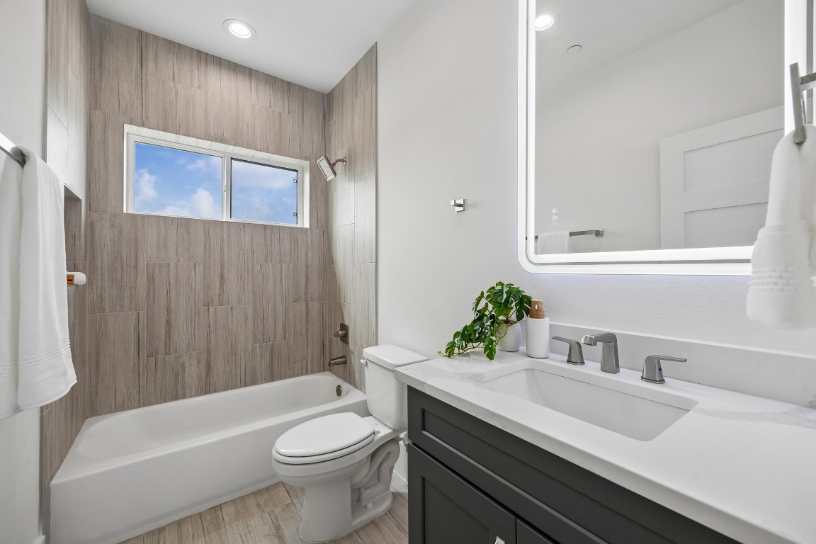 1618 Ojeman Road, Unit A Houston, TX 77055 - Photo 23 of 39 There is a full bath on the fourth floor that opens onto the family room.