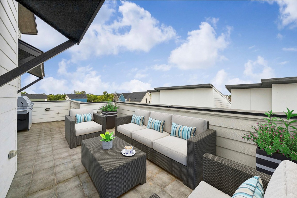 1618 Ojeman Road, Unit A Houston, TX 77055 - Photo 4 of 39 The rooftop terrace on the fourth level has unobstructed views and privacy walls. There is a gas hookup for your grill and plenty of seating space for lounging and entertaining.