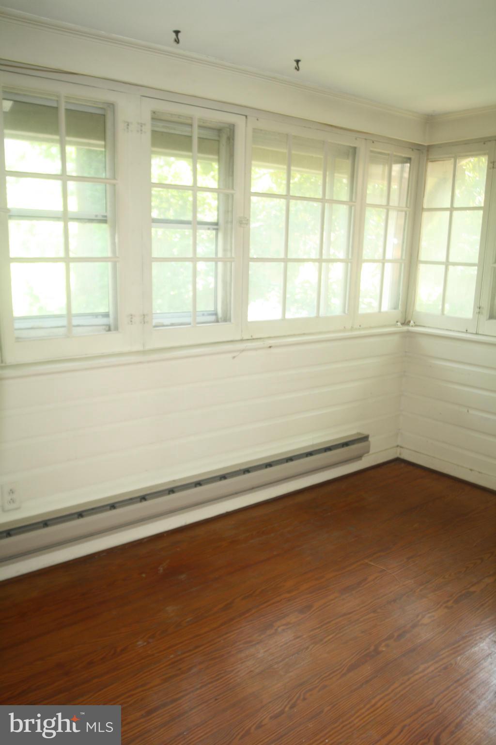 802 Silver Spring Avenue Silver Spring, MD 20910 - Photo 9 of 13 Rear Sun Room