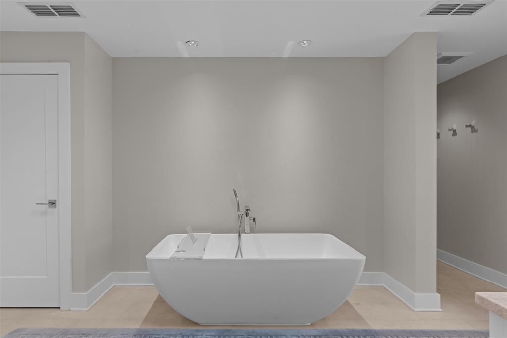 6117 Merrymount Road Westover Hills, TX 76107 - Photo 22 of 39 Full bath featuring baseboards and a freestanding bath