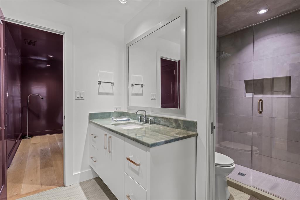 6117 Merrymount Road Westover Hills, TX 76107 - Photo 30 of 39 Full bathroom with vanity, a stall shower, recessed lighting, and light wood-style flooring