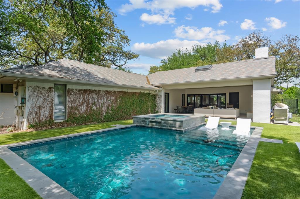 6117 Merrymount Road Westover Hills, TX 76107 - Photo 35 of 39 Integrated pool / hot tub featuring a patio and a lawn