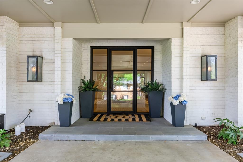 6117 Merrymount Road Westover Hills, TX 76107 - Photo 8 of 39 Property entrance featuring brick siding