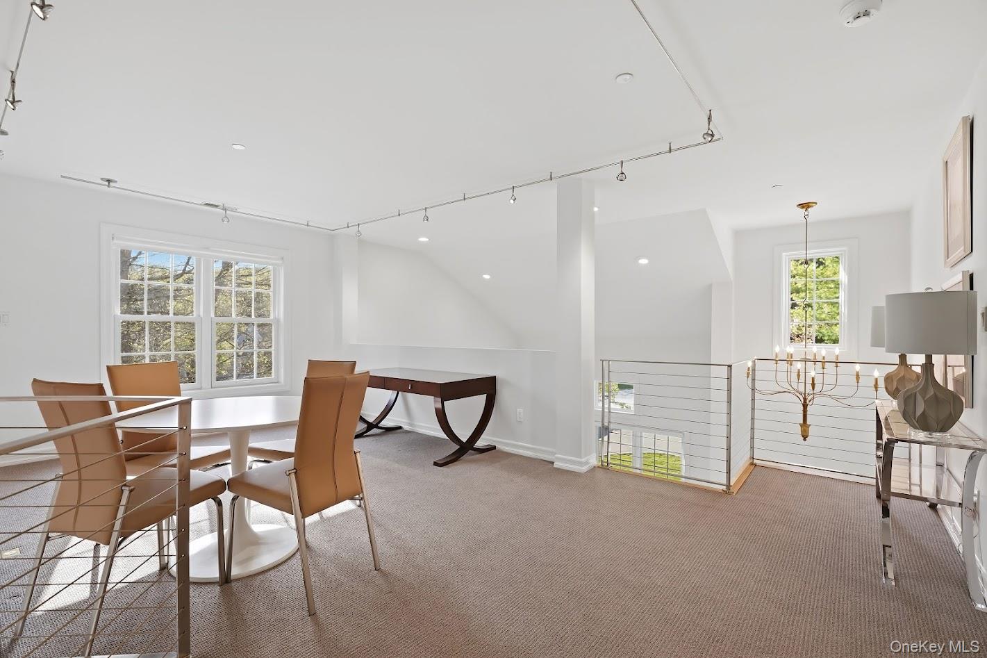 72 Burr Farms Road Mount Kisco, NY 10549 - Photo 15 of 28 a view of a livingroom with furniture and a table