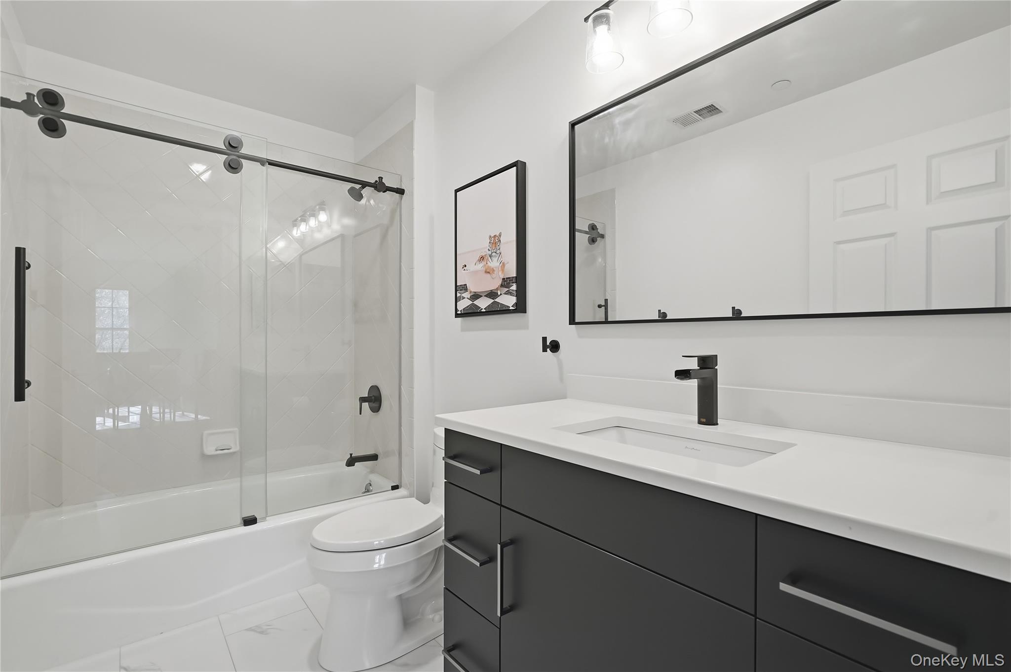 72 Burr Farms Road Mount Kisco, NY 10549 - Photo 17 of 28 a bathroom with a sink a toilet and shower