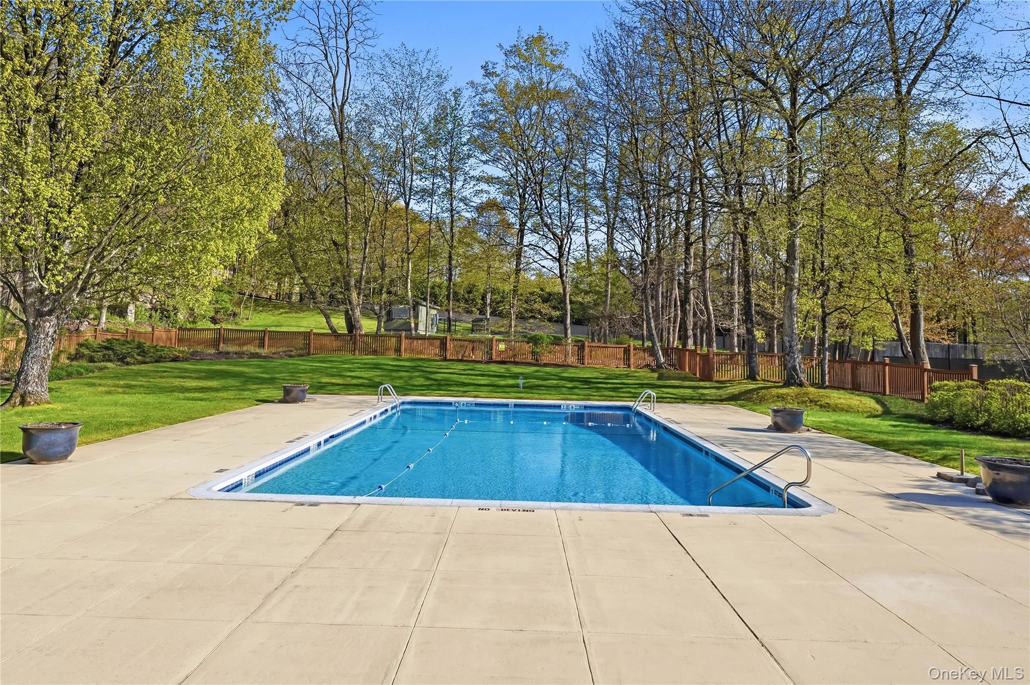 72 Burr Farms Road Mount Kisco, NY 10549 - Photo 24 of 28 a view of backyard with swimming pool and outdoor seating