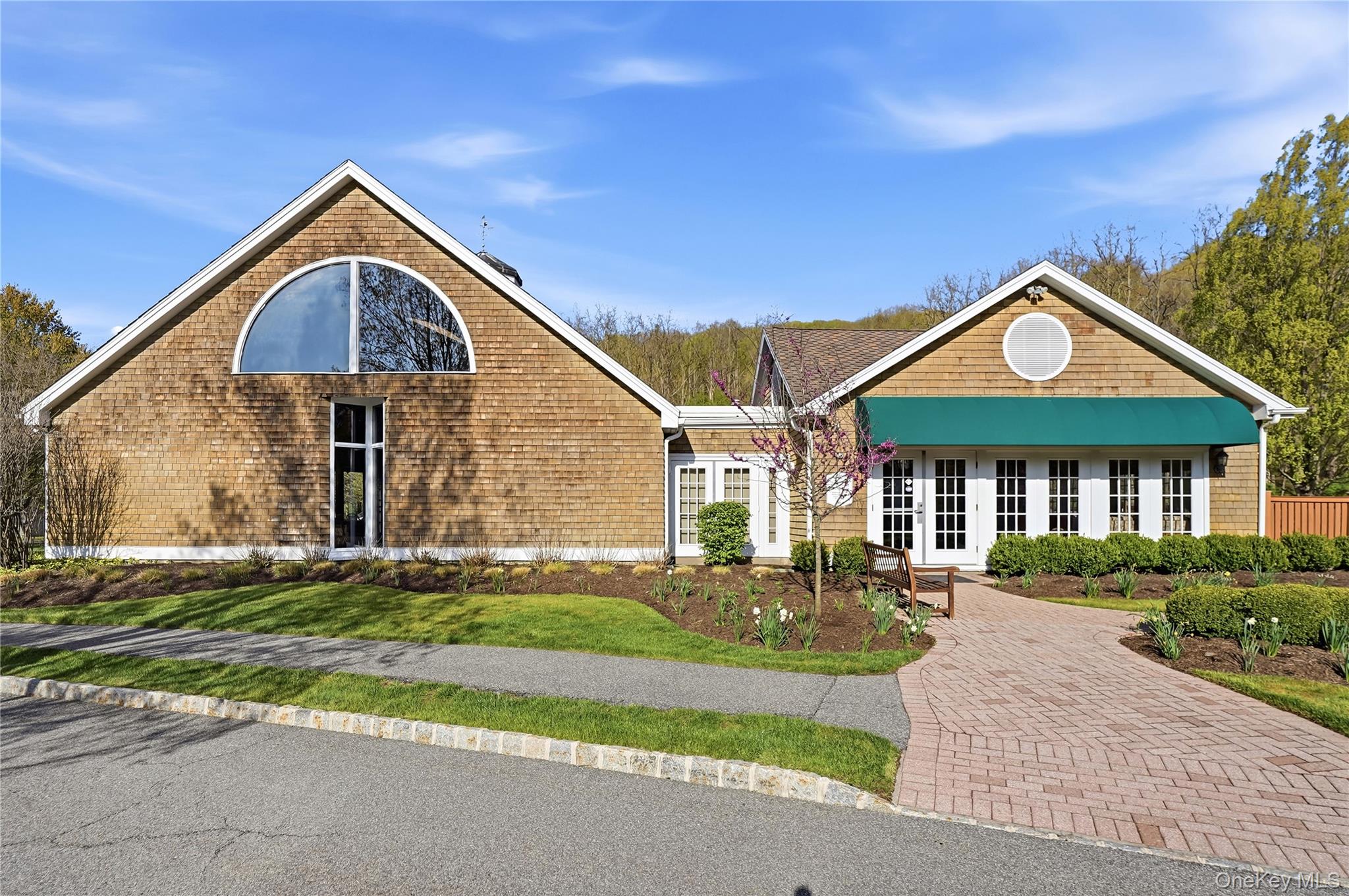 72 Burr Farms Road Mount Kisco, NY 10549 - Photo 27 of 28 a front view of a house with a yard