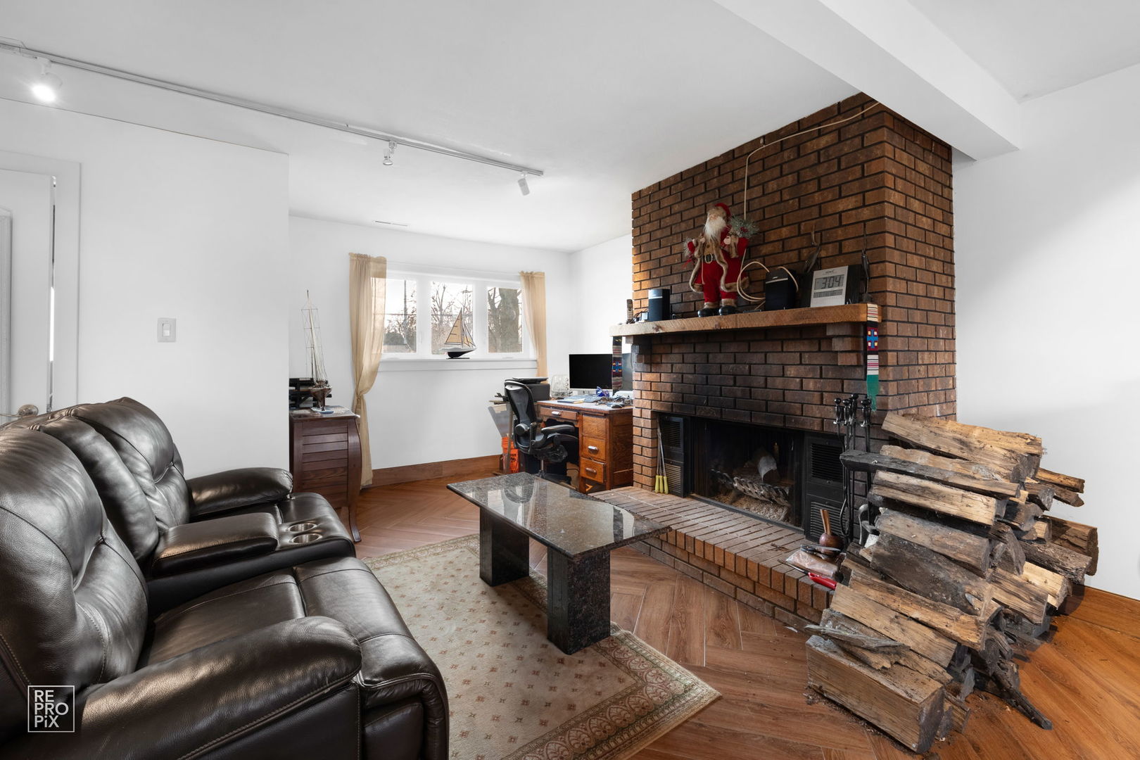 362 63rd Street Willowbrook, IL 60527 - Photo 16 of 25 a living room with furniture and a fireplace